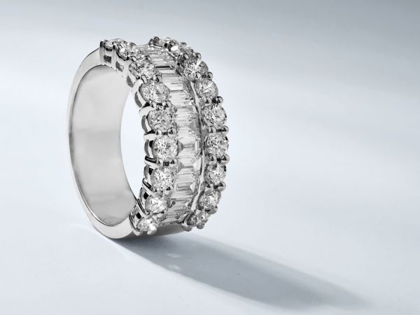 18kt White Gold Baguette And Round Diamond Right Hand Ring.