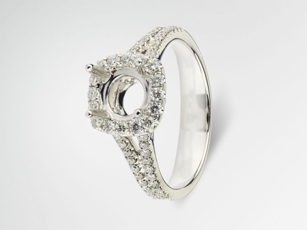 18kt White Gold Cushion Shape Halo With A Two Row Split Shank