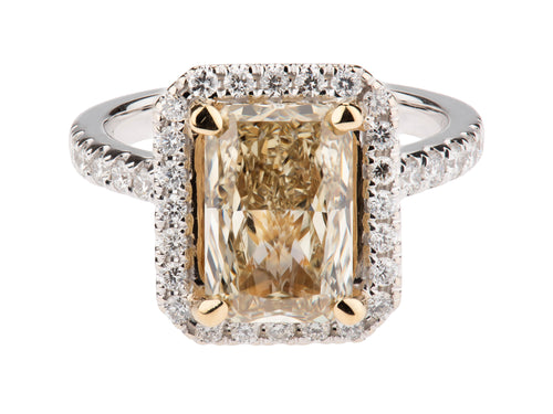 Radiant Yellow Diamond and White Round Diamond Ring