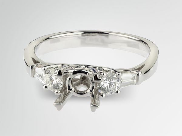 18kt White Gold Baguette And Round Diamond Engagement Ring