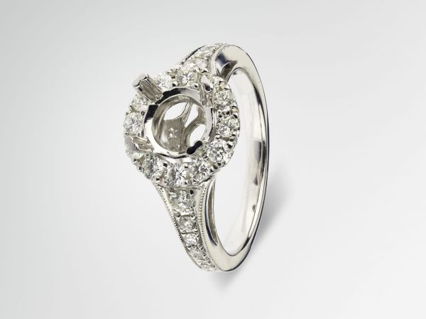 14kt White Gold Round Halo With A Graduated Diamond Shank
